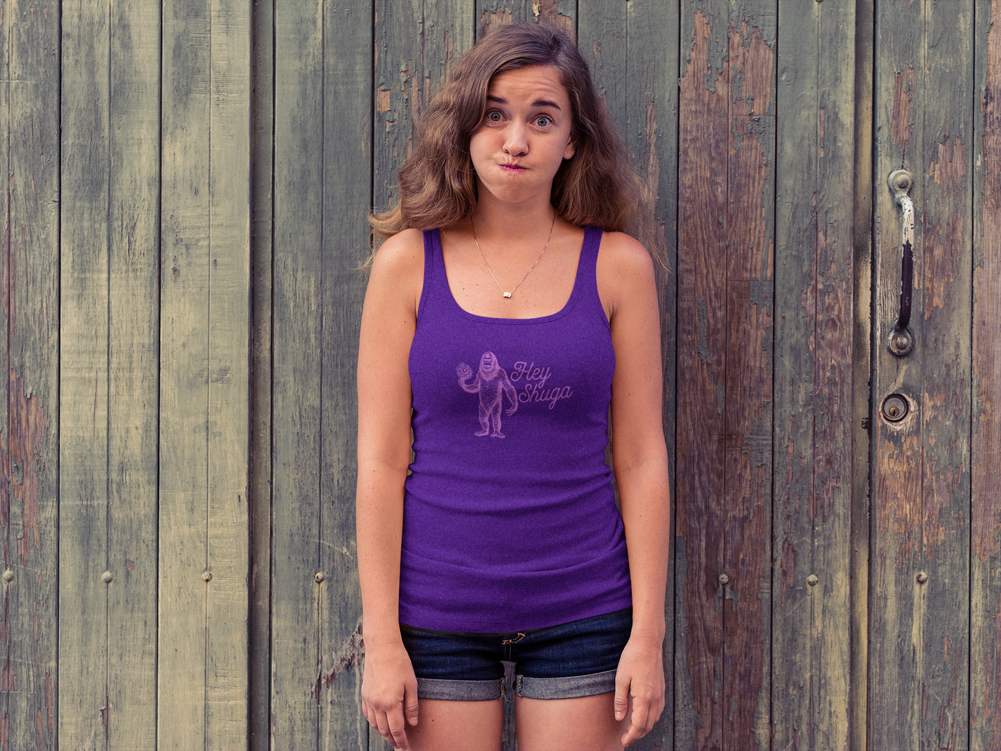 Hey Shuga Women’s Racerback Tank – Bigfoot Holding Flowers in Pink